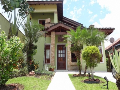 CASA TEMPORADA BERTIOGA NO CONDOMÍNIO MORADA...